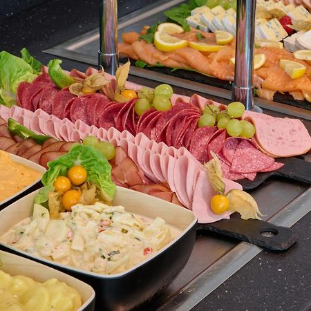 Leonardo Hotel&Residenz Muenchen Esterno foto Breakfast buffet