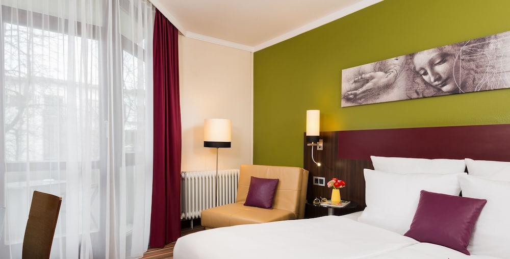 Leonardo Hotel&Residenz Muenchen Esterno foto Room interior