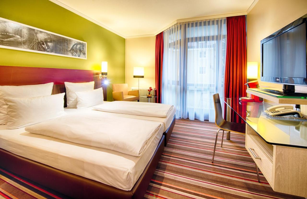 Leonardo Hotel&Residenz Muenchen Esterno foto Room of a hotel